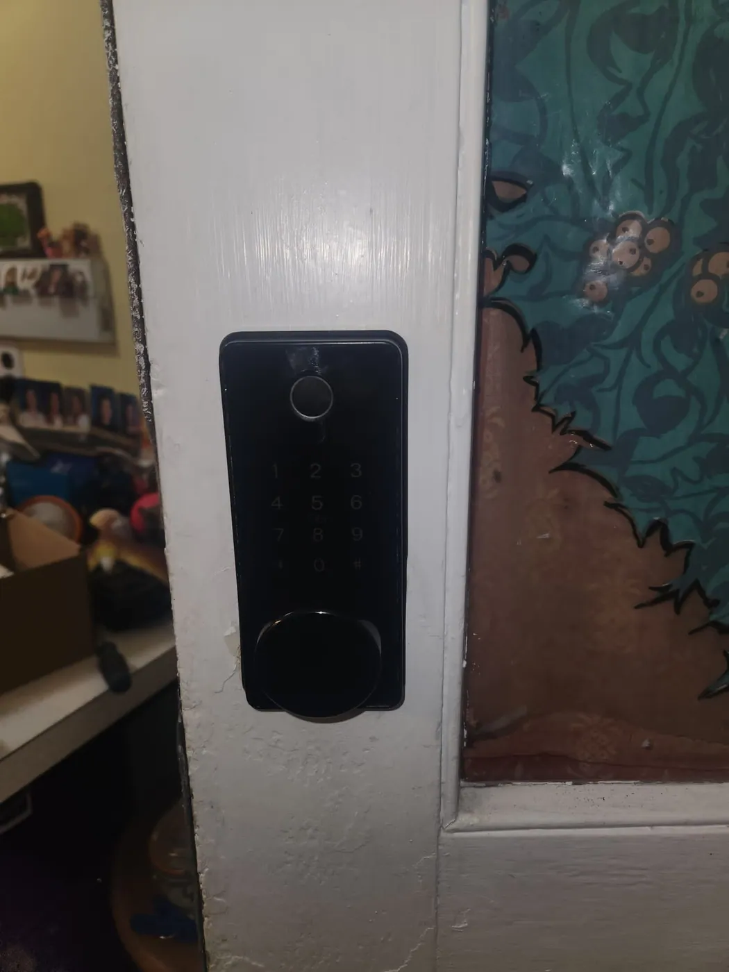Smart keypad deadbolt fitted to a home entry door